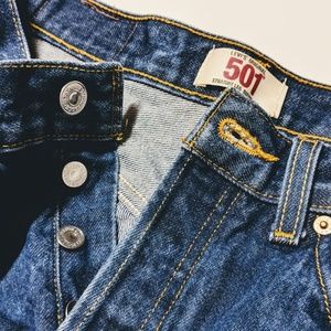 Levi's 501 blue jeans.